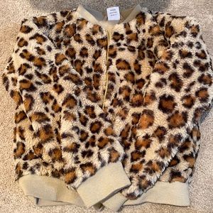 Wonder Nation Girls faux fur animal print jacket. Lined inside. Golden Zipper.